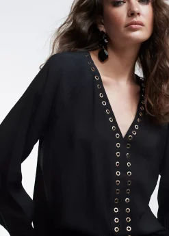 Blusa detalle eyelets