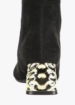 Bota caña alta con tacón dorado