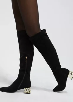 Bota caña alta con tacón dorado