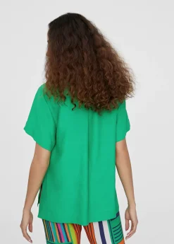 Camisa fluida con bolsillos