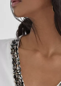 Camiseta escote joyas