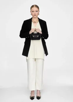 Mini bandolera con logo grabado