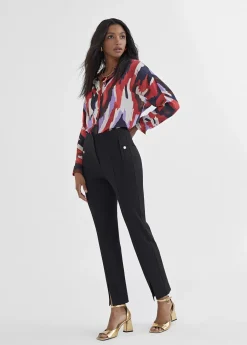 Pantalón pitillo abertura