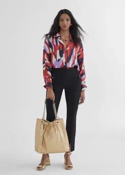 Pantalón pitillo abertura