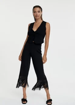 Pantalón punto flecos