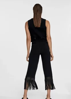 Pantalón punto flecos