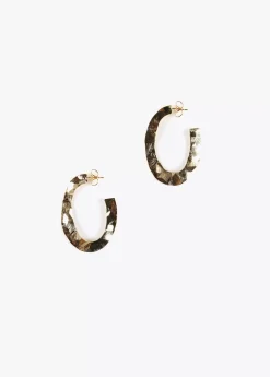 Pendientes dorados y ovalados