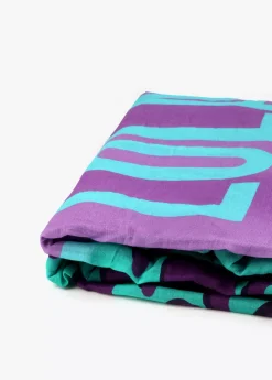 Toalla leopardo turquesa.