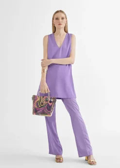 Top largo con aberturas