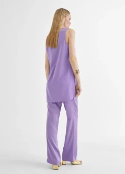 Top largo con aberturas