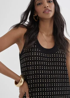 Top largo con piezas metalicas