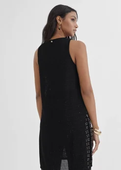 Top largo con piezas metalicas