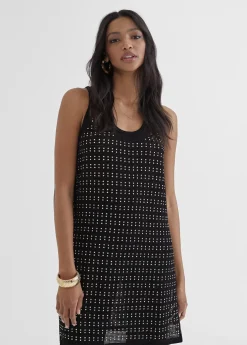 Top largo con piezas metalicas