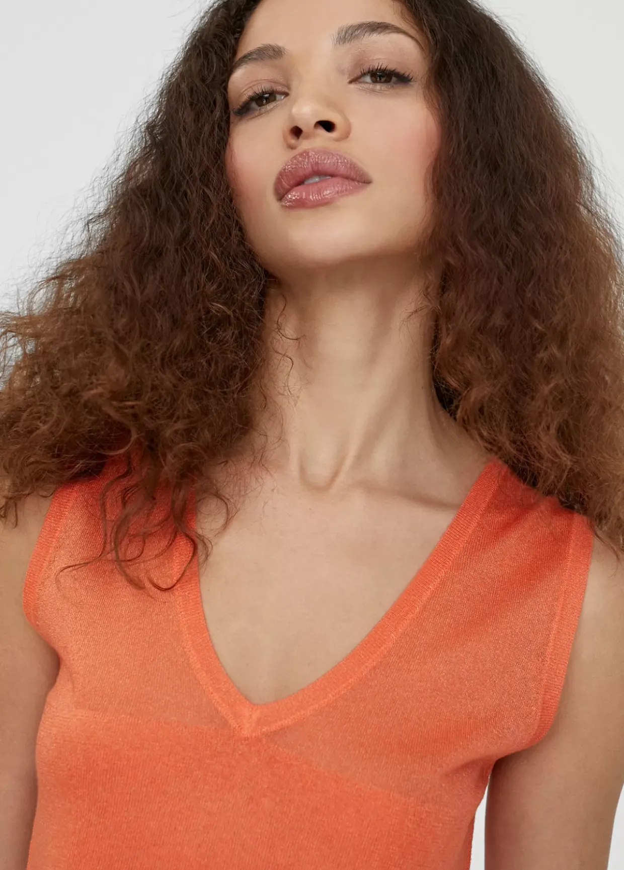 Top punto color liso